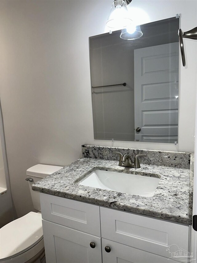 10 Middleton Ln, Atmore, AL 36502 - bathroom with toilet and vanity