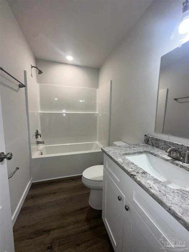 10 Middleton Ln, Atmore, AL 36502 - bathroom featuring toilet, shower / bath combination, vanity, and wood finished floors