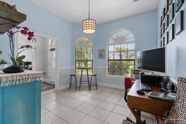 3849 Saber Tooth Cir, Gulf Breeze, FL 32563 - office featuring light tile patterned flooring and baseboards