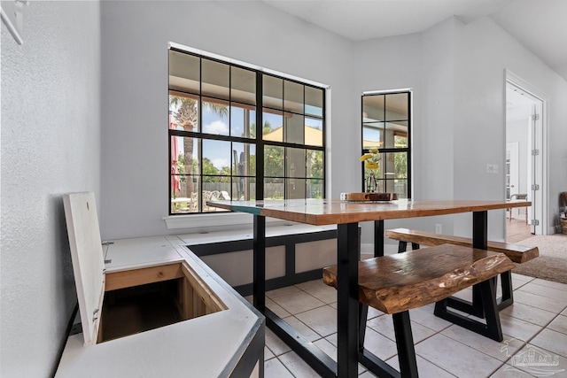 3849 Saber Tooth Cir, Gulf Breeze, FL 32563 - dining area with light tile patterned floors and a textured wall