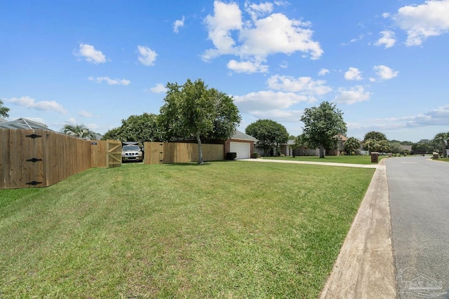 3849 Saber Tooth Cir, Gulf Breeze, FL 32563 - view of yard with a gate and driveway