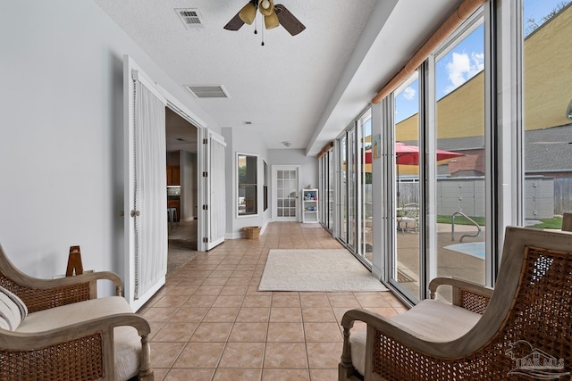 3849 Saber Tooth Cir, Gulf Breeze, FL 32563 - sunroom with tile patterned flooring and baseboards