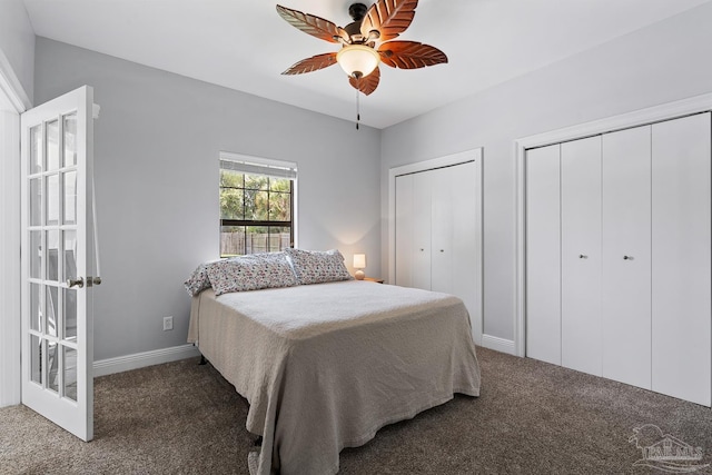 3849 Saber Tooth Cir, Gulf Breeze, FL 32563 - carpeted bedroom featuring two closets and ceiling fan