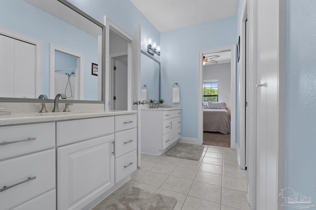 3849 Saber Tooth Cir, Gulf Breeze, FL 32563 - full bath featuring vanity, tile patterned floors, and connected bathroom