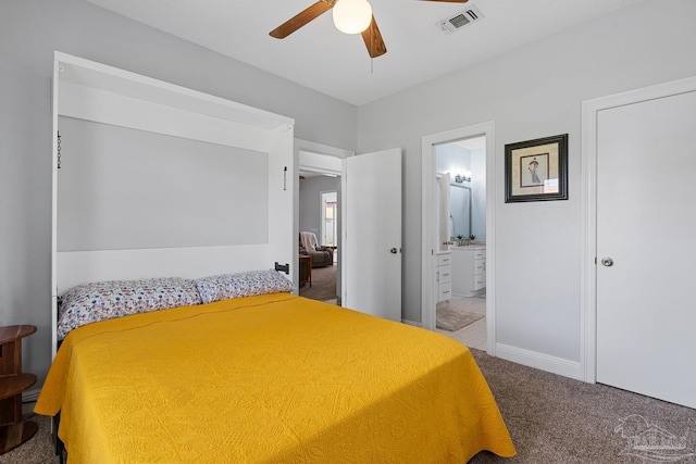 3849 Saber Tooth Cir, Gulf Breeze, FL 32563 - bedroom featuring carpet floors, connected bathroom, and ceiling fan