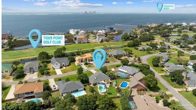 3849 Saber Tooth Cir, Gulf Breeze, FL 32563 - aerial view of residential area featuring a nearby body of water and a pool