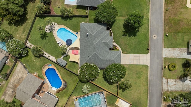 3849 Saber Tooth Cir, Gulf Breeze, FL 32563 - drone / aerial view of a pool