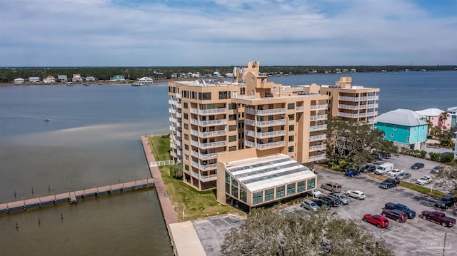 birds eye view of property featuring a water view