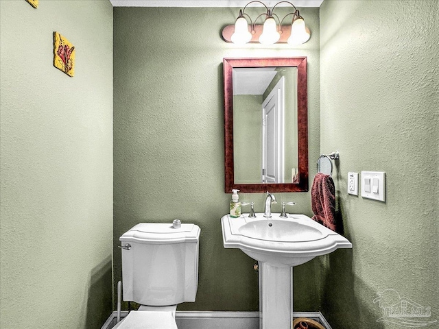 bathroom featuring toilet