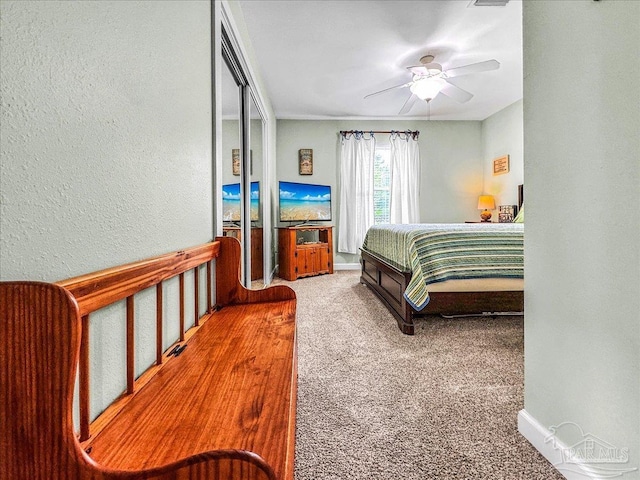 bedroom featuring carpet and ceiling fan