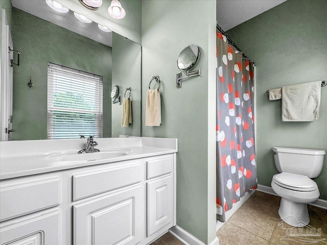 bathroom with vanity, curtained shower, toilet, and tile patterned flooring