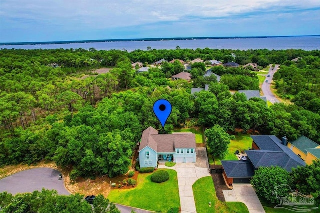 drone / aerial view with a water view