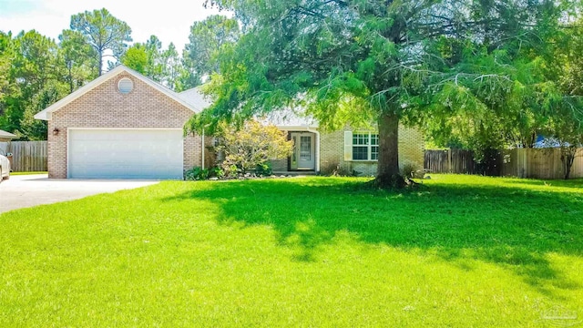 7543 Loop St, Navarre, FL 32566 - view of front of property featuring brick siding, an attached garage, and driveway