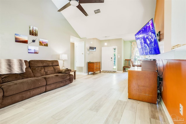 7543 Loop St, Navarre, FL 32566 - living room with ceiling fan, high vaulted ceiling, and light wood-style flooring