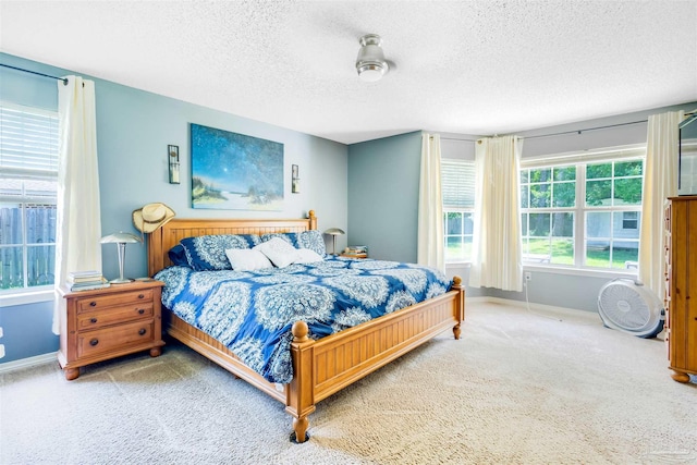 7543 Loop St, Navarre, FL 32566 - bedroom with carpet floors and a textured ceiling