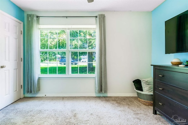 7543 Loop St, Navarre, FL 32566 - carpeted bedroom featuring baseboards