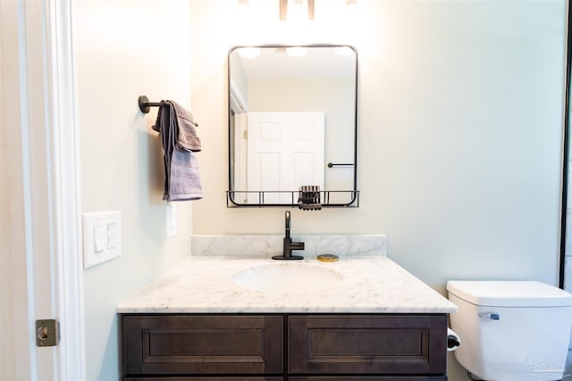 7543 Loop St, Navarre, FL 32566 - bathroom with vanity and toilet