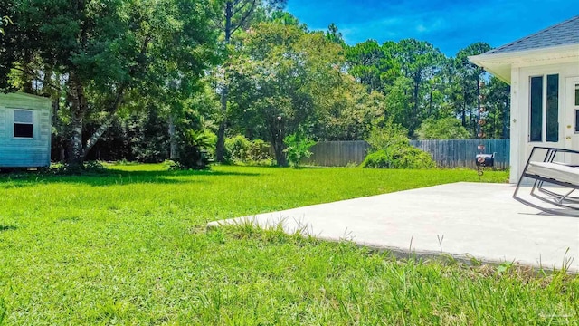 7543 Loop St, Navarre, FL 32566 - view of yard featuring a patio