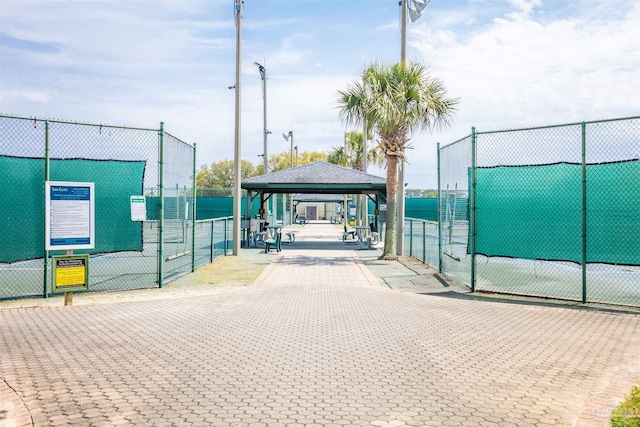 7543 Loop St, Navarre, FL 32566 - view of property's community with a gazebo and a tennis court