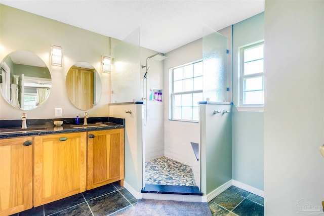 7543 Loop St, Navarre, FL 32566 - full bathroom with a walk in shower and double vanity