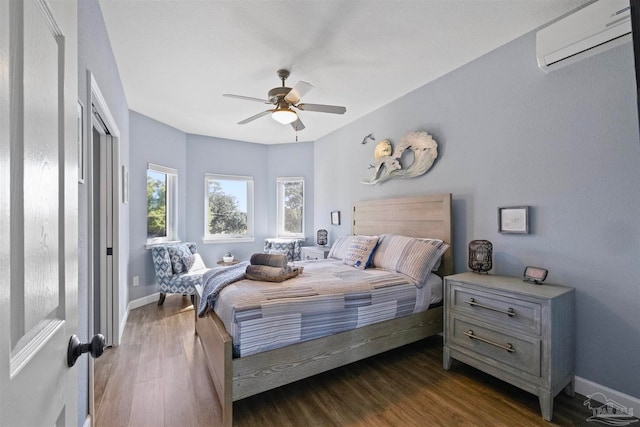 bedroom with an AC wall unit, a closet, ceiling fan, and dark wood-type flooring