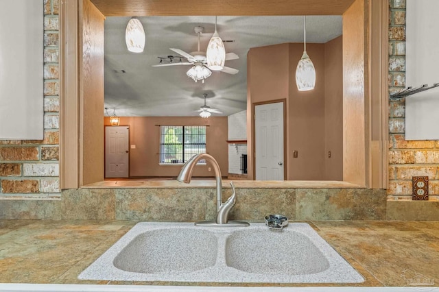 2931 Pine Forest Rd, Cantonment, FL 32533 - kitchen featuring a sink and a ceiling fan