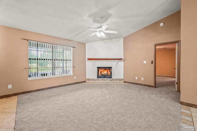 2931 Pine Forest Rd, Cantonment, FL 32533 - unfurnished living room with a ceiling fan, a textured ceiling, a brick fireplace, light carpet, and vaulted ceiling