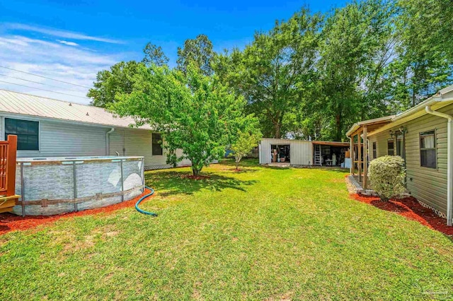 2931 Pine Forest Rd, Cantonment, FL 32533 - view of green lawn featuring an outbuilding