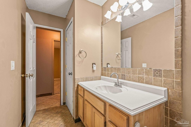 2931 Pine Forest Rd, Cantonment, FL 32533 - bathroom with vanity, tile patterned floors, tile walls, and a wainscoted wall