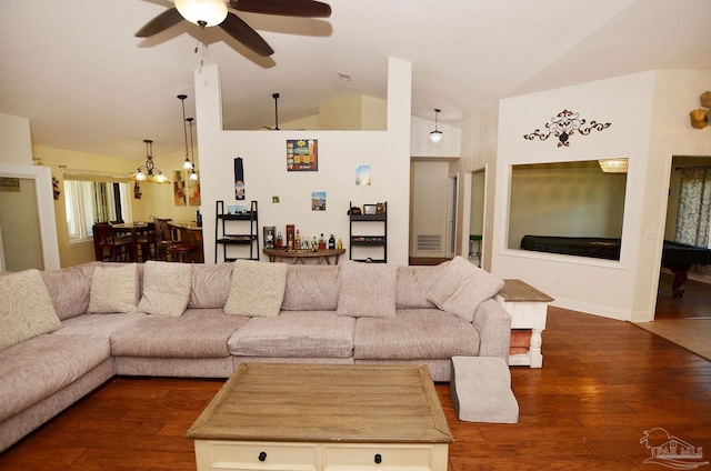 living room with vaulted ceiling, ceiling fan, and dark hardwood / wood-style floors