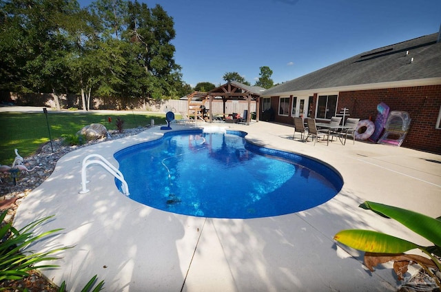 view of swimming pool with a lawn, a patio area, and a gazebo