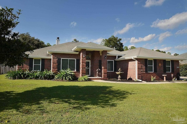 ranch-style house with a front lawn