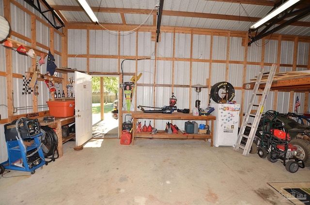 garage with a workshop area