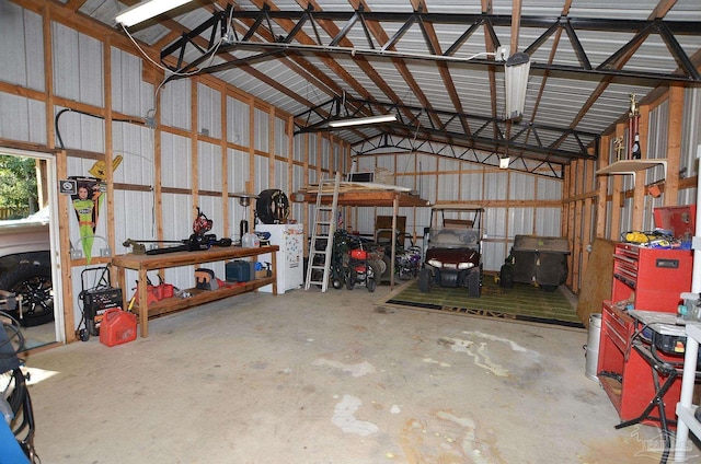 garage with a workshop area