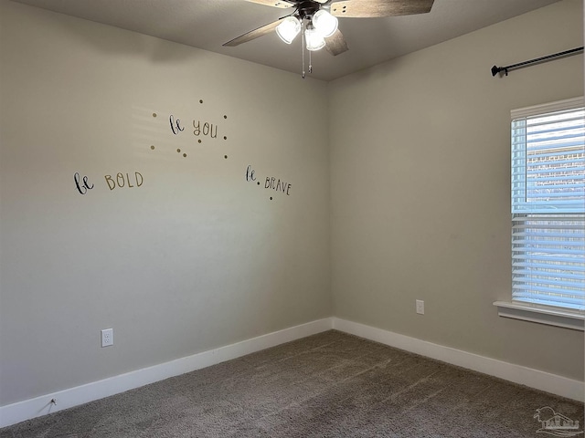 carpeted empty room with ceiling fan