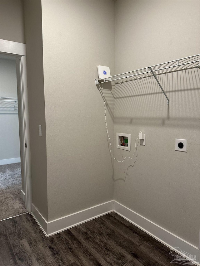 washroom featuring dark hardwood / wood-style floors, hookup for a washing machine, and hookup for an electric dryer