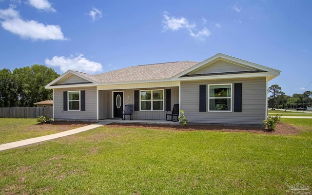430 Morris Ave, Cantonment, FL 32533 - ranch-style home with a porch and roof with shingles