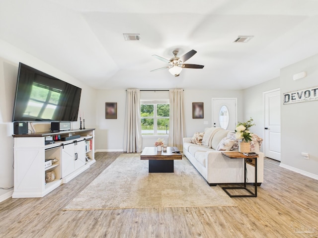 430 Morris Ave, Cantonment, FL 32533 - living room with light wood-type flooring, a ceiling fan, and baseboards