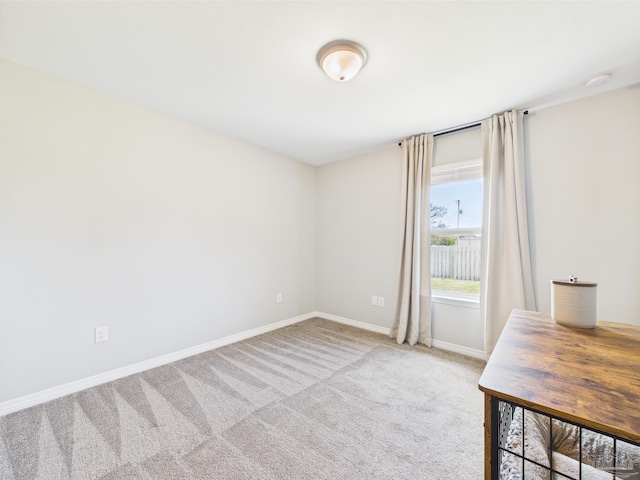 430 Morris Ave, Cantonment, FL 32533 - unfurnished room with carpet floors, baseboards, and a smoke detector