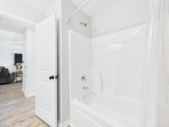 430 Morris Ave, Cantonment, FL 32533 - full bathroom featuring wood finished floors and shower / bathtub combination with curtain
