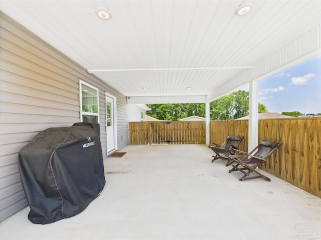430 Morris Ave, Cantonment, FL 32533 - view of patio featuring a grill and fence