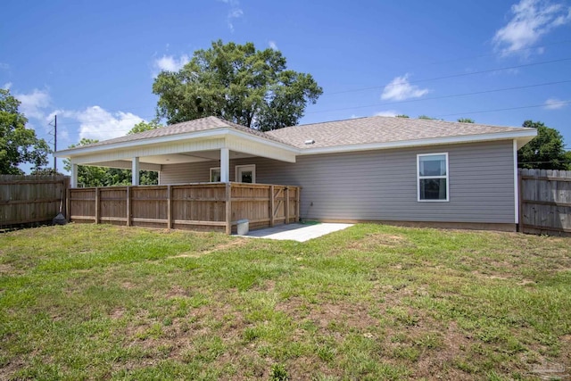 430 Morris Ave, Cantonment, FL 32533 - rear view of property featuring roof with shingles and a patio area