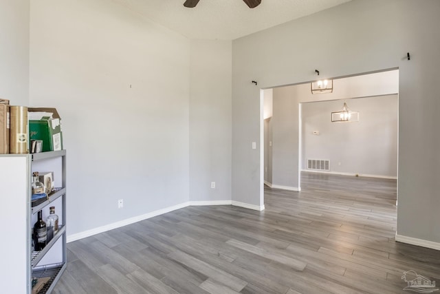 2405 Ursula Ln, Pensacola, FL 32526 - unfurnished room featuring wood finished floors, baseboards, a ceiling fan, and visible vents