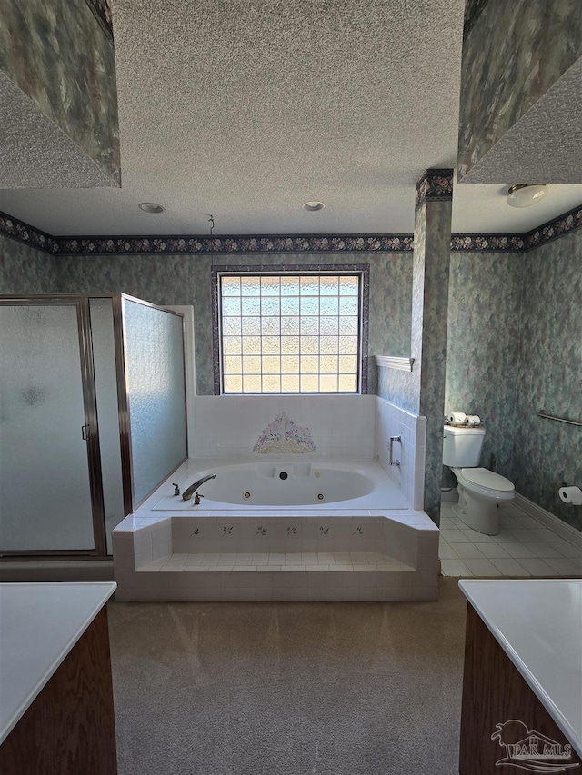 bathroom featuring toilet, plus walk in shower, and a textured ceiling