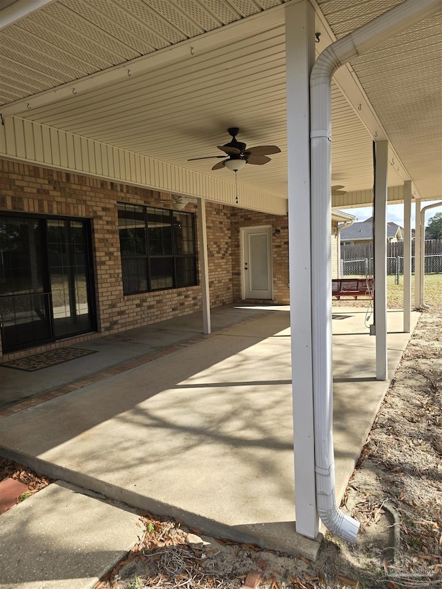 view of patio featuring ceiling fan