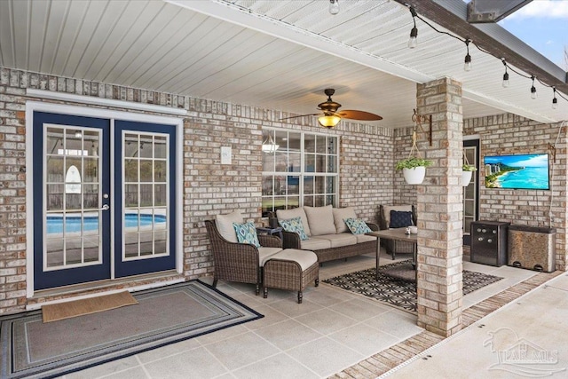 view of patio featuring ceiling fan and outdoor lounge area