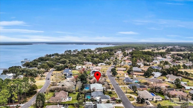 bird's eye view featuring a water view and a residential view