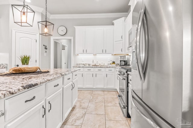2120 Eagles Ridge Cv, Cantonment, FL 32533 - kitchen featuring stainless steel appliances, ornamental molding, white cabinets, light stone counters, and decorative light fixtures