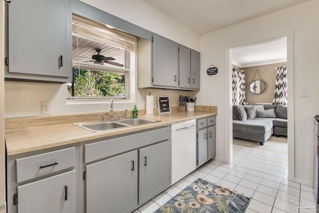 kitchen featuring light tile patterned flooring, sink, gray cabinetry, ceiling fan, and white dishwasher