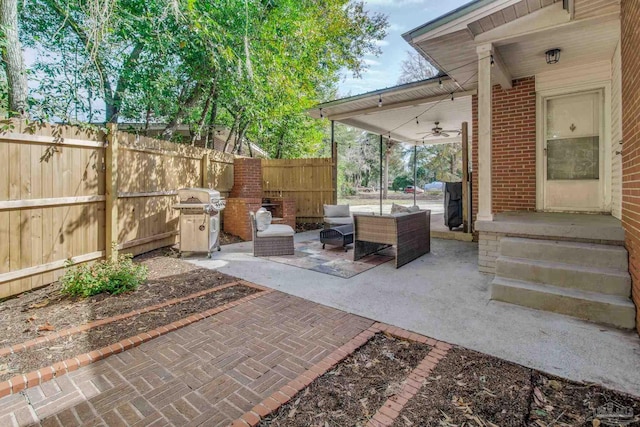 view of patio / terrace featuring ceiling fan, grilling area, and outdoor lounge area